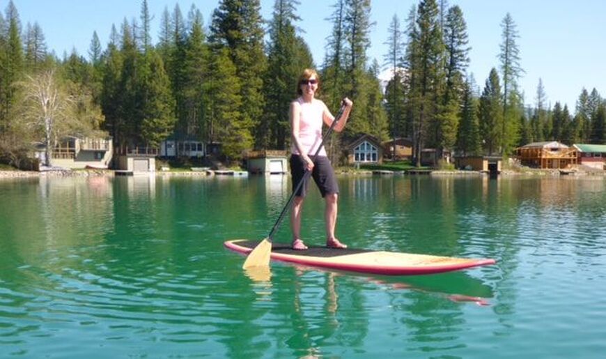 standing_on_hard_paddle_board