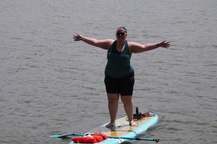 proud_fat_woman_on_paddle_board