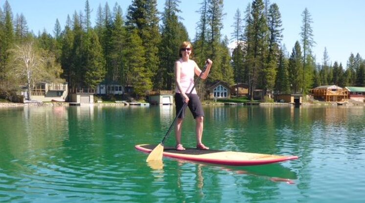 standing_on_hard_paddle_board