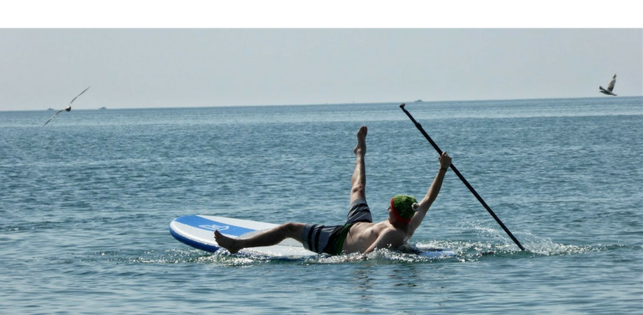 falling_off_paddle_board